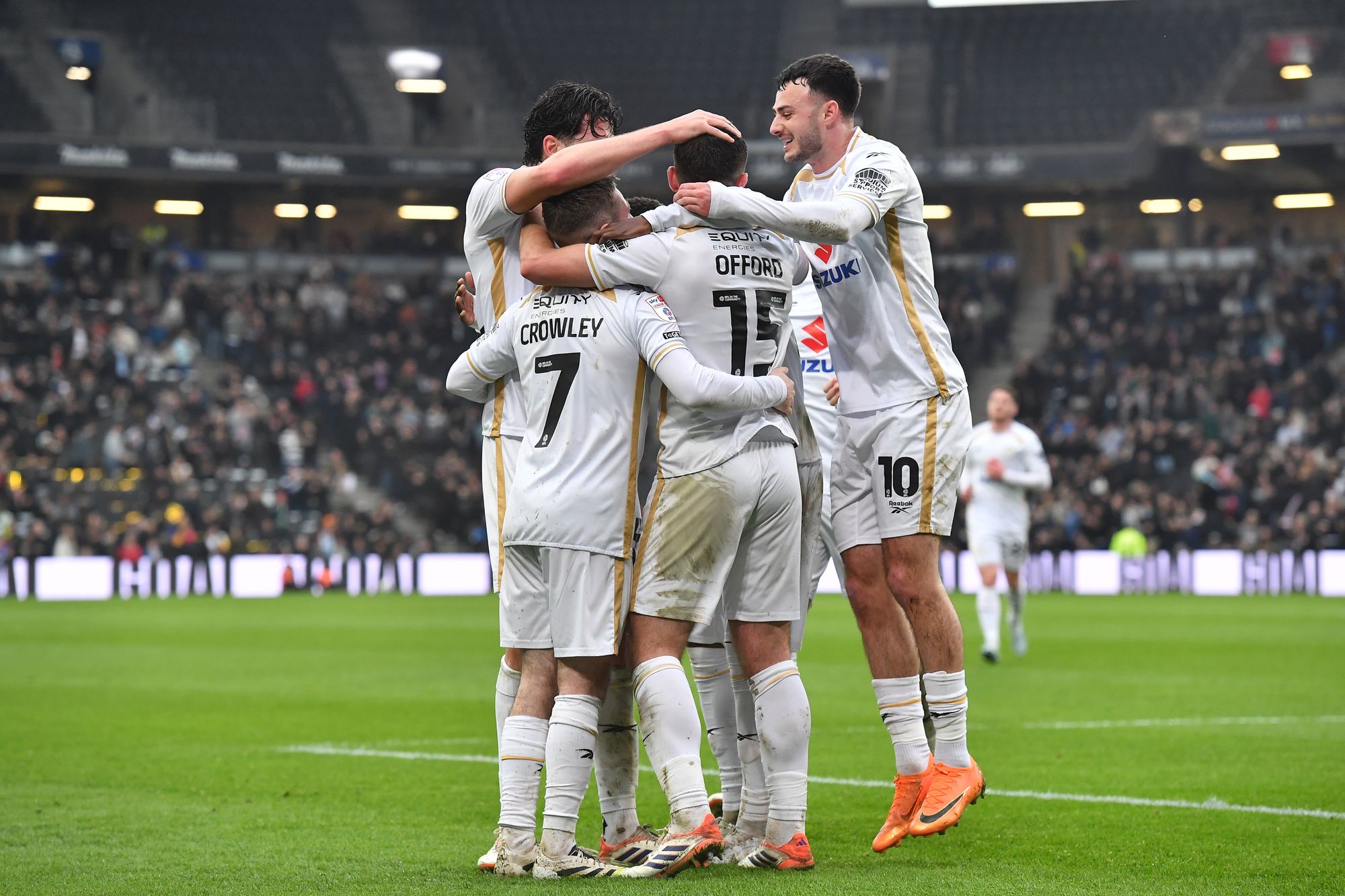 Weaver backs MK Dons to seal promotion after beating his Harrogate side