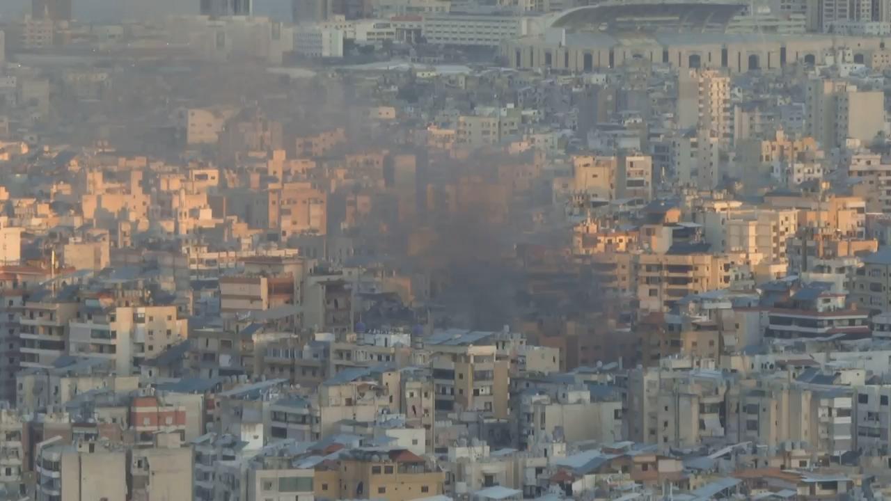 Black smoke billows into Beirut sky after explosion as Israel continues ...