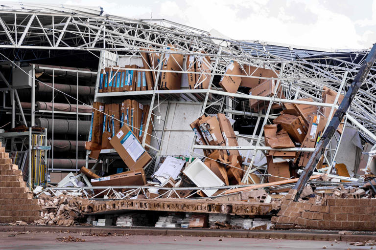 Photos show damage left by powerful storms as volunteers help ...