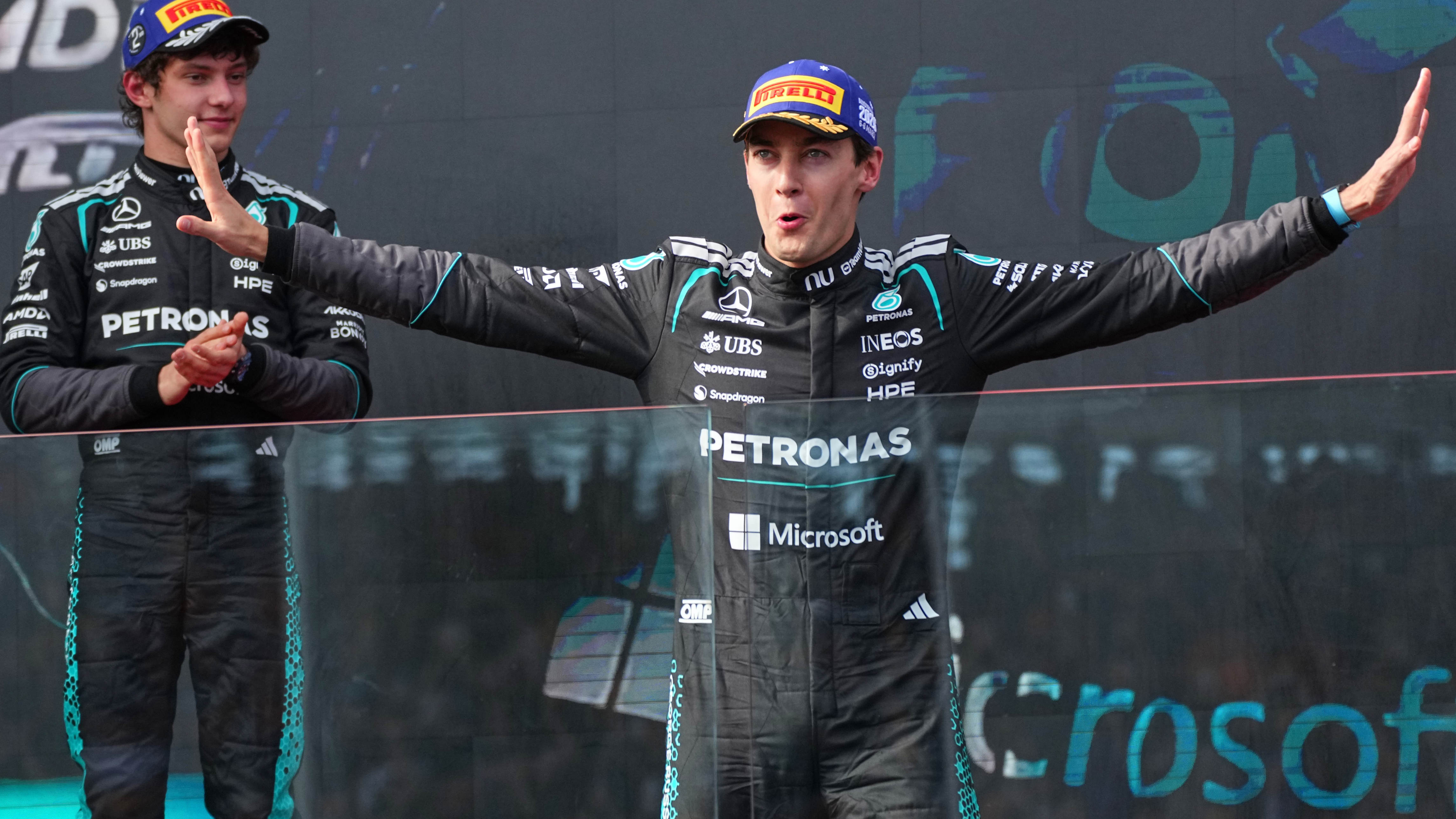George Russell enjoys 'hell of a fight' to win season-opening race in ...