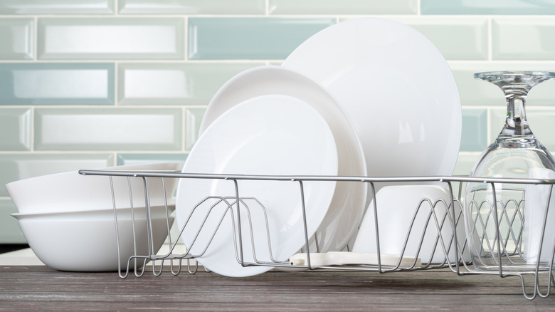 If your plates look like this, it's time to toss them out, according to ...