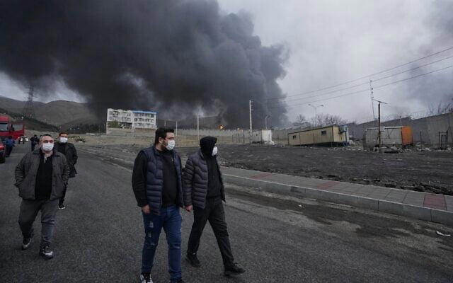 Black clouds over Tehran rain down oil drops after Israel strikes oil ...