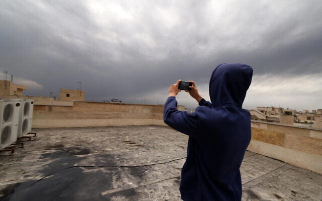 Black clouds over Tehran rain down oil drops after Israel strikes oil ...