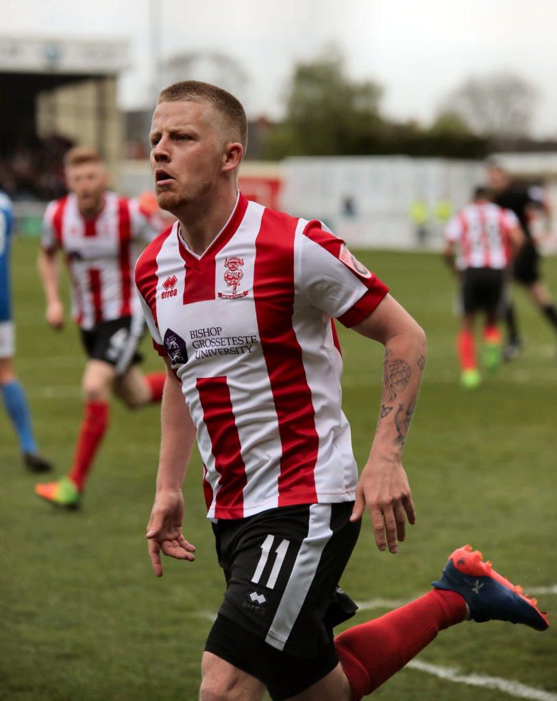 Lincoln City promotion hero seals deal with title-chasing club