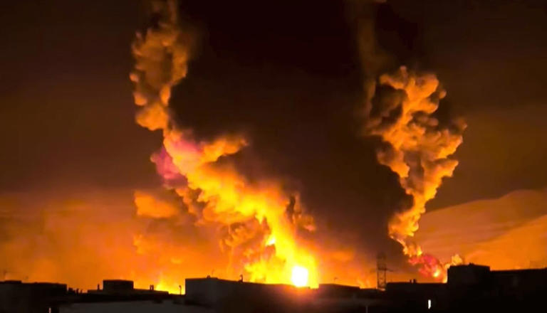Tehran oil depots on fire after Israel launches first strike on Iran's ...