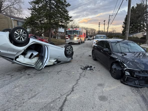 Vehicle crashes into parked car, rolls over in Allegheny County