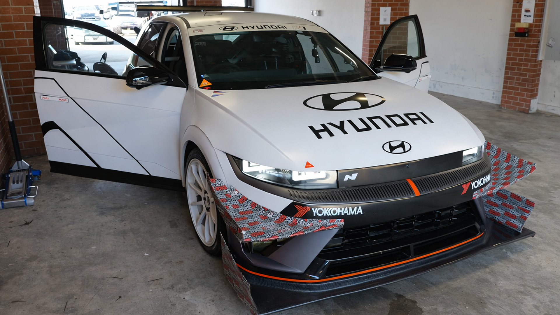Can this custom electric car handle extreme downforce on track?