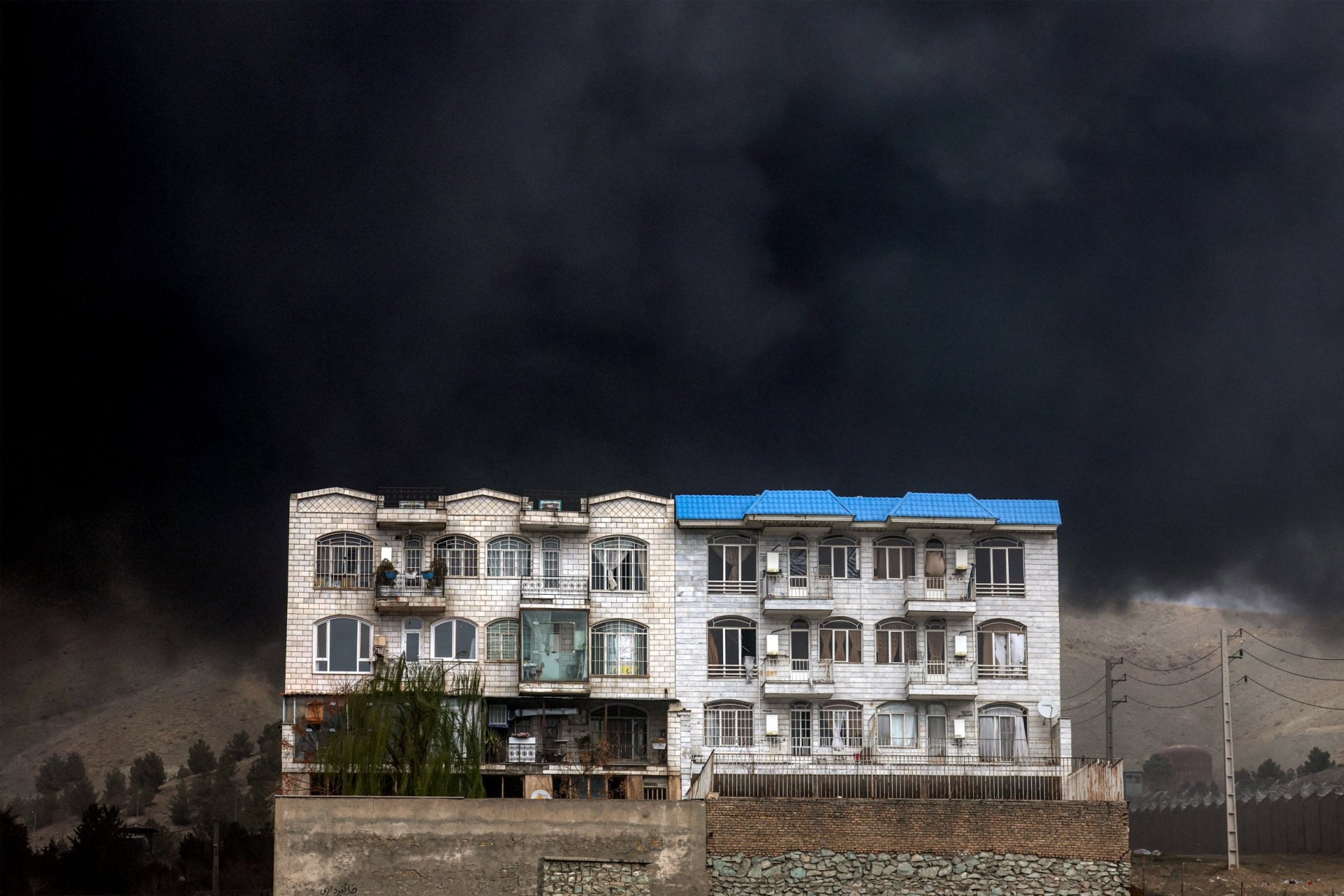Iranians warned of toxic rain after Israeli strikes on oil depots