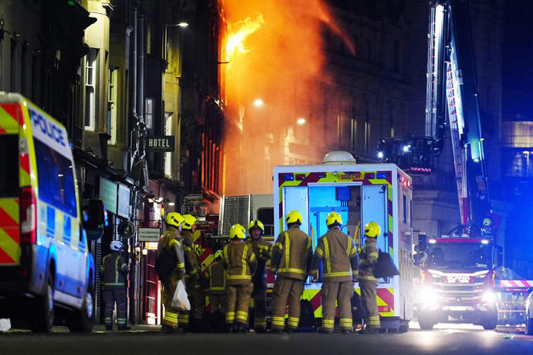 Part of UK train station 'collapses' during huge blaze as firefighters ...