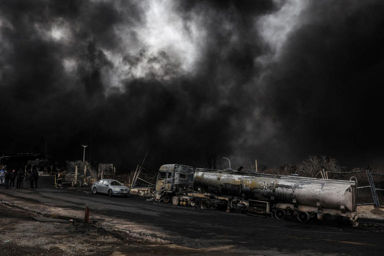 Tehran in flames: Black smoke, burning streets after oil depots hit in ...