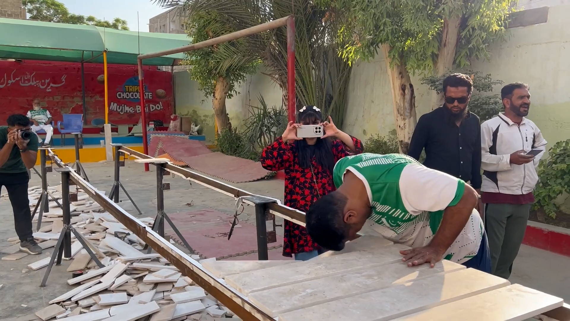 Most marble slabs broken with the head in one minute 57 by Muhammad Rashid