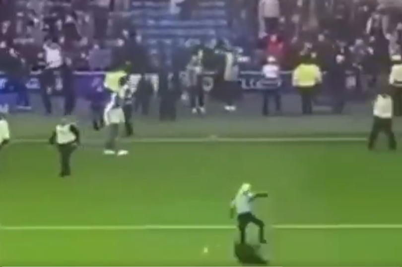 Fan floored in shocking 'kick' assault during Rangers v Celtic pitch ...