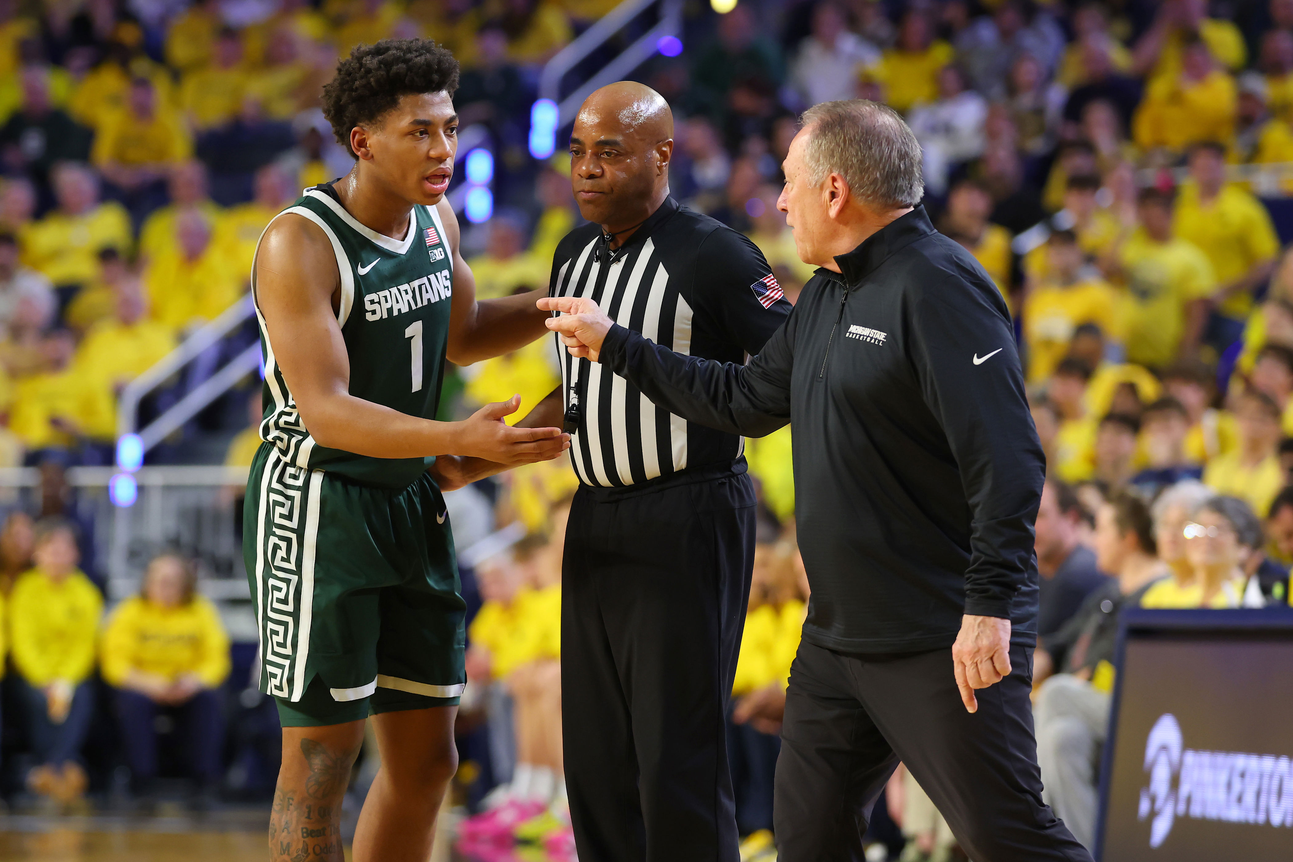 Michigan State's Jeremy Fears T'd up for groin kick of Elliot Cadeau as ...