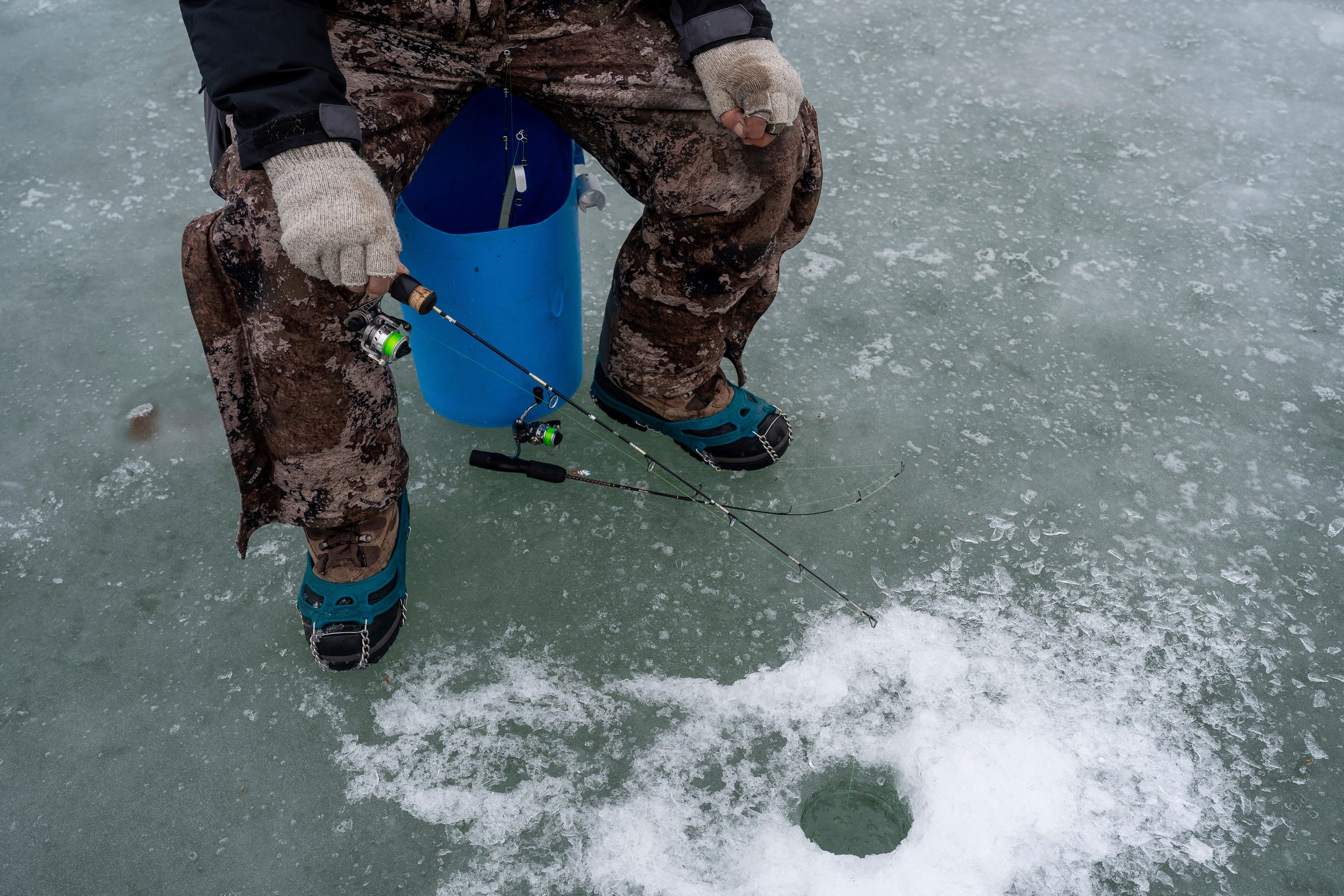 Ice fishers continue taking to the lakes even as temperatures rise
