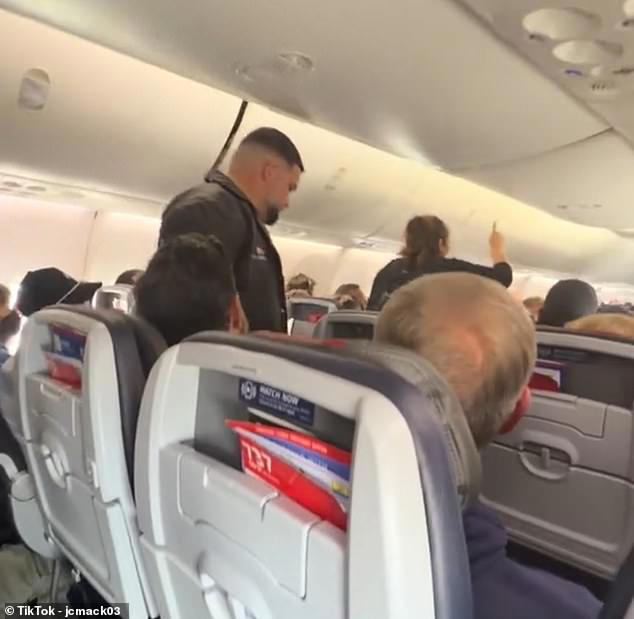 Obnoxious passenger erupts in fury as she's booted off plane for ...