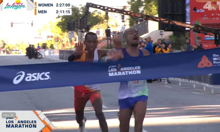 Nail-biting moment American surges past rival in final strides of LA ...