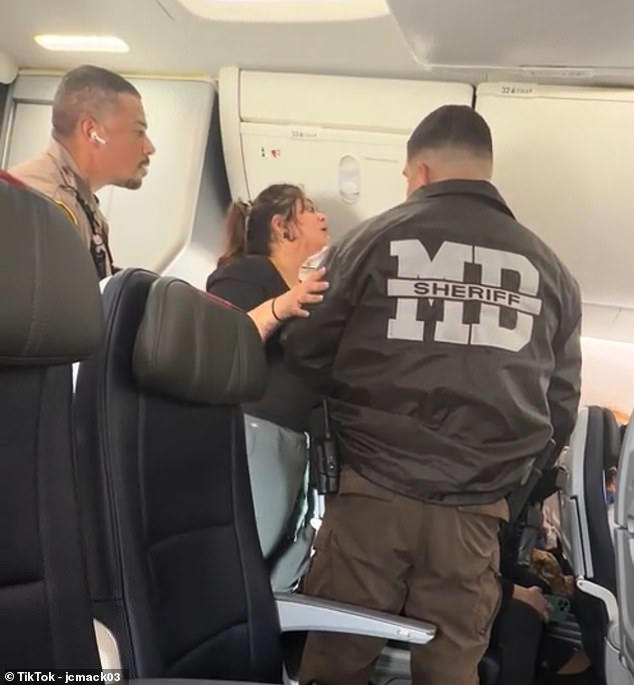 Obnoxious passenger erupts in fury as she's booted off plane for ...
