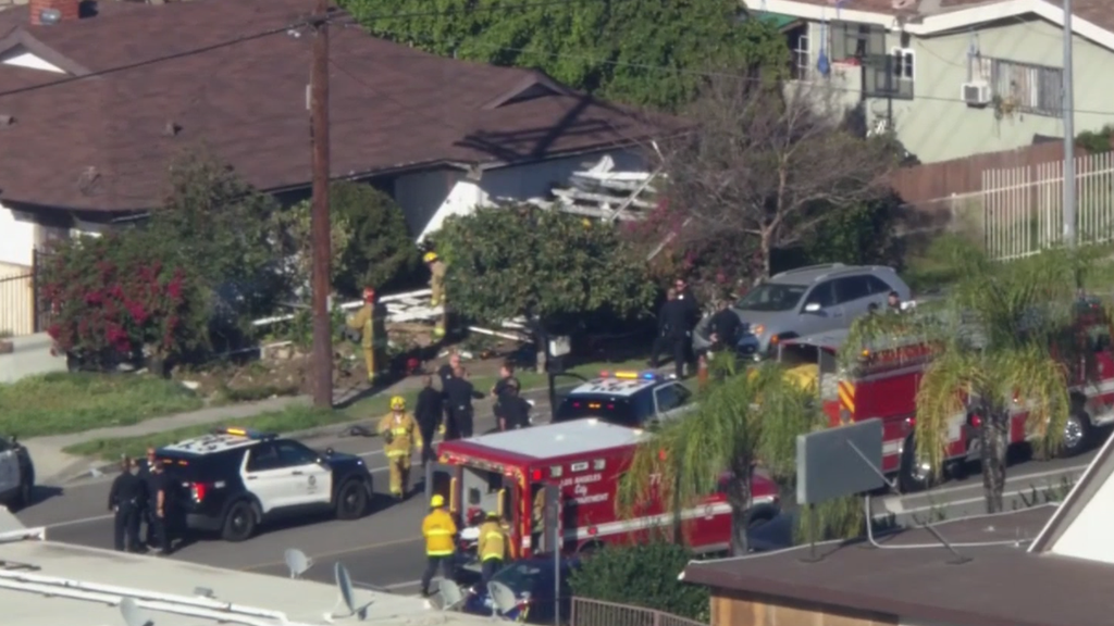Pursuit suspect loses control of car and slams into Sun Valley home ...