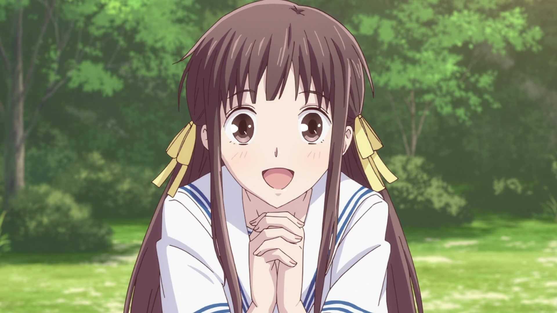 Tohru Honda looks pleased and clasps her hands in Fruits Basket