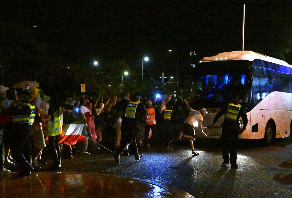Iranian women's football team signal 'SOS' from bus amid safety fears