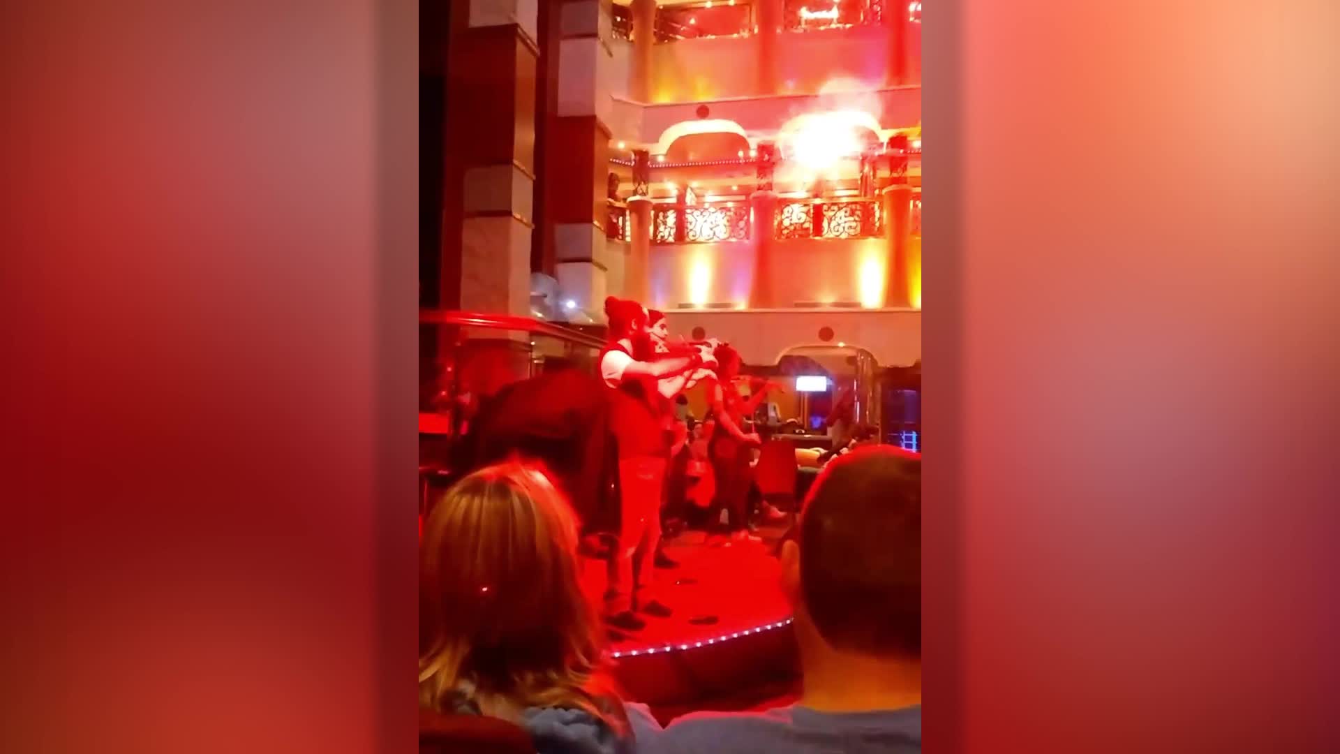 Cruise band plays Titanic theme as lights go out