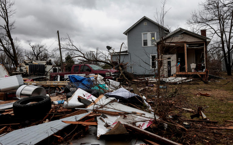 See photos of aftermath left behind by tornadoes in Oklahoma, Michigan