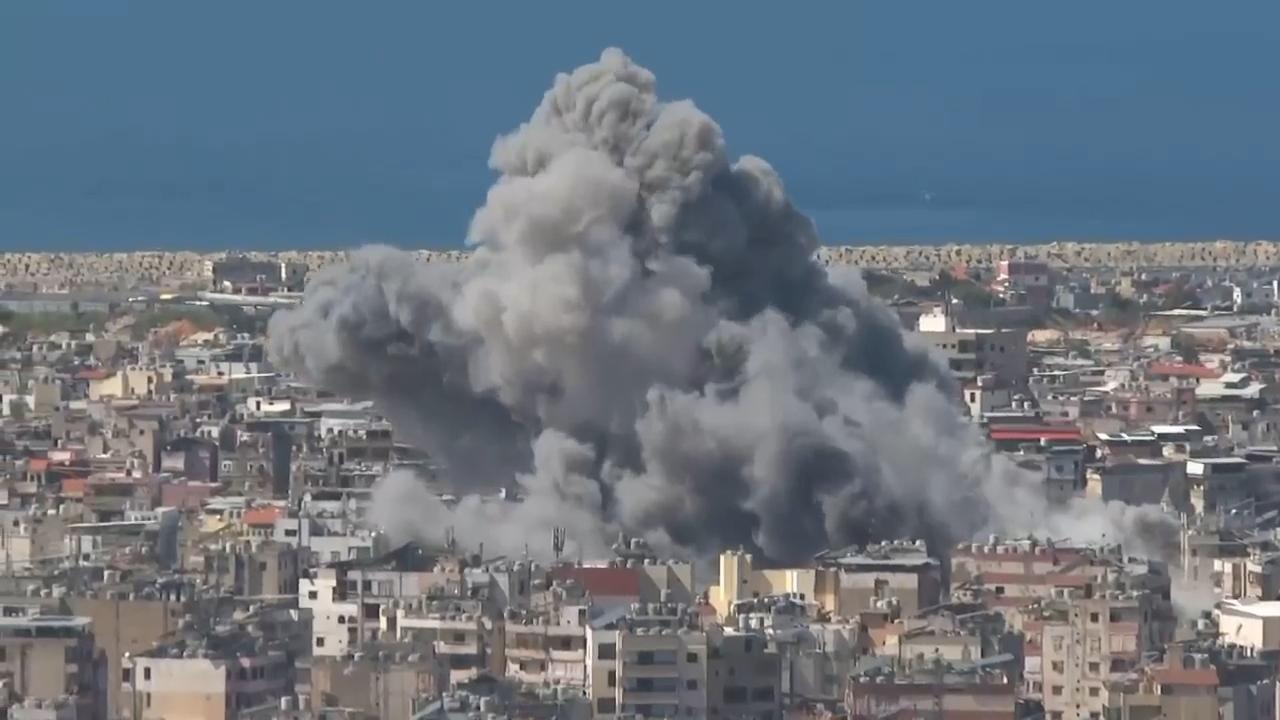 Strikes in Beirut send plumes of smoke into the air