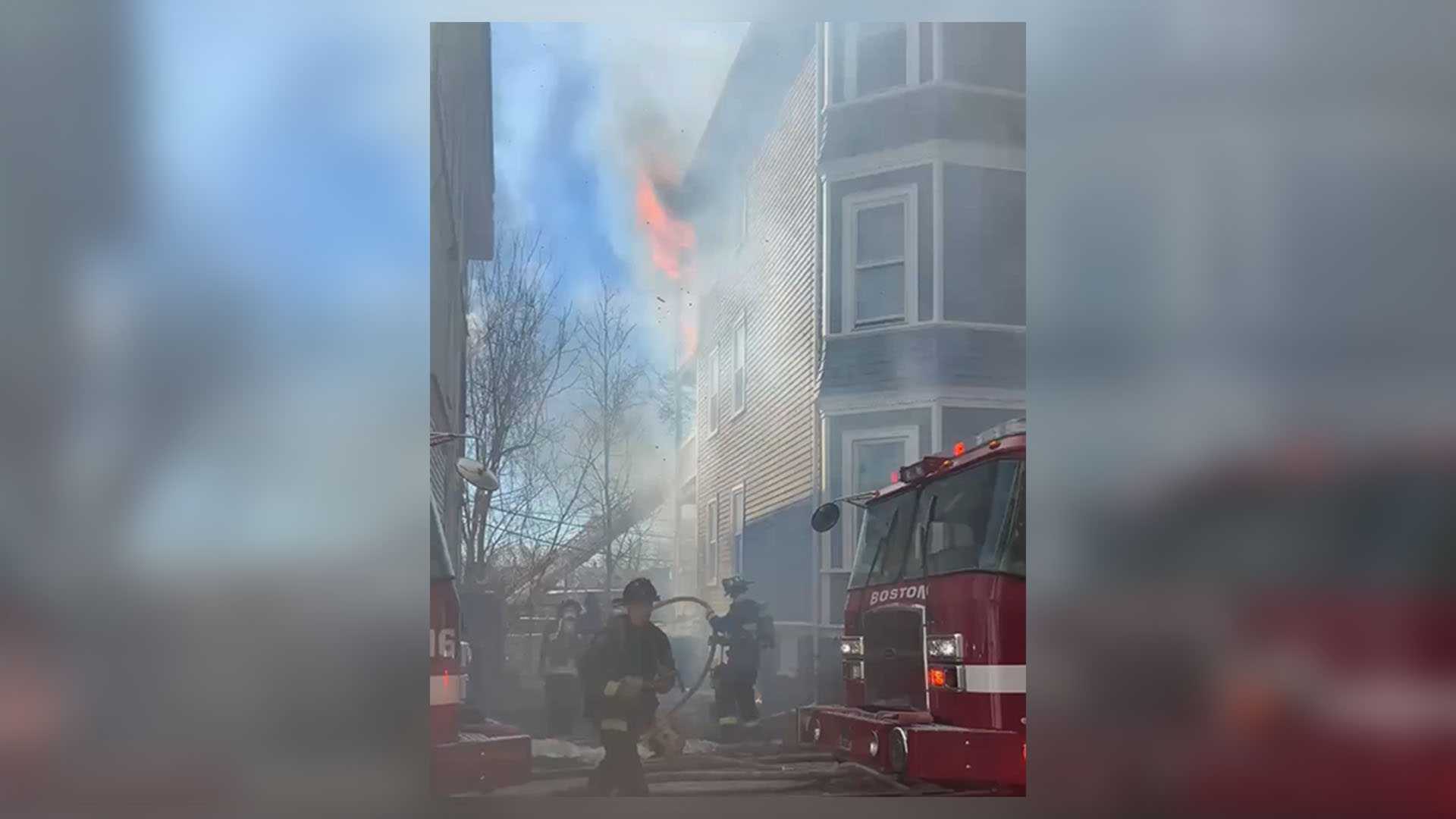 1 firefighter hurt as crews battle multi-alarm fire in Boston triple decker