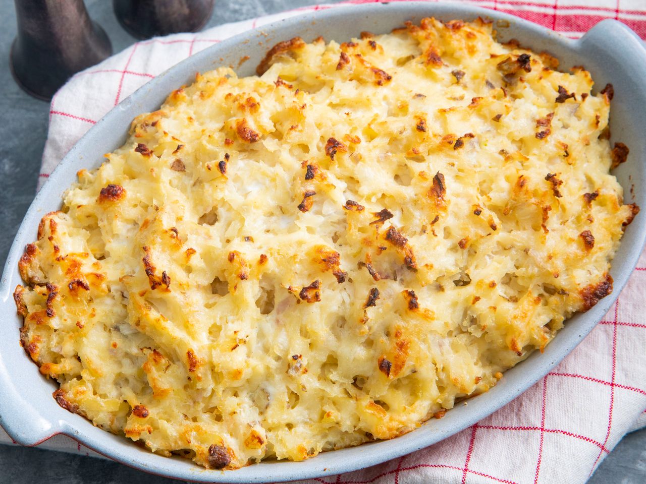 high angle looking into a casserole dish of steakhouse potatoes romanoff