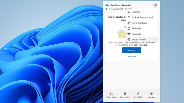 Pausing sync for OneDrive on Windows 11.