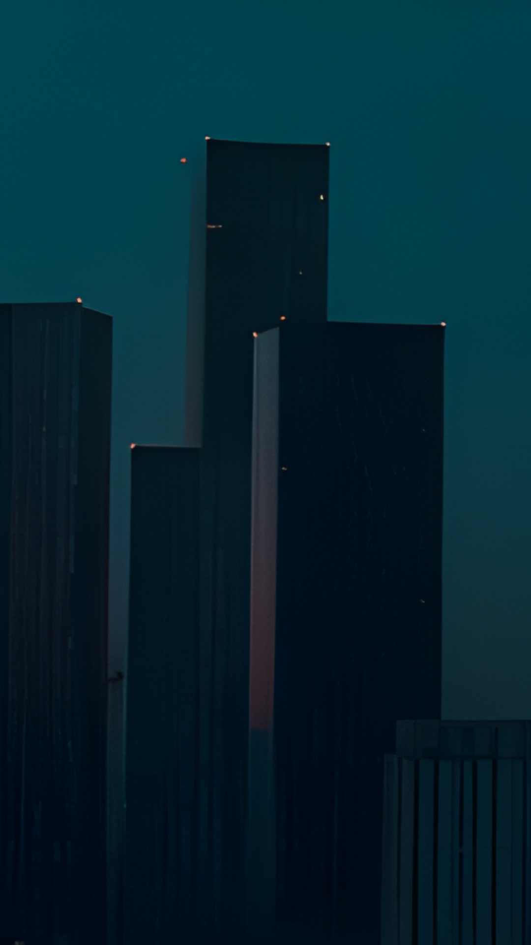 City lights at night are pure magic under a dark blue sky