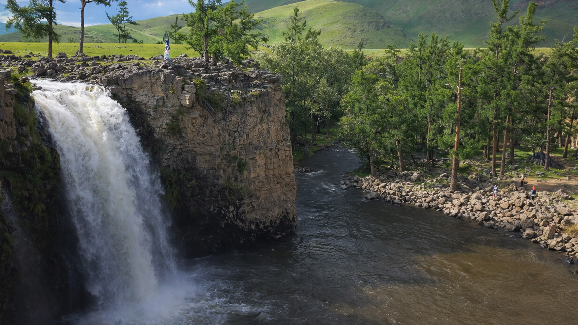 A cliff waterfall hidden in Mongolia’s wide valley