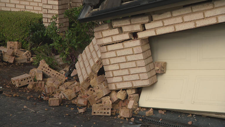 Police car swerves into western Sydney home for second time in two years