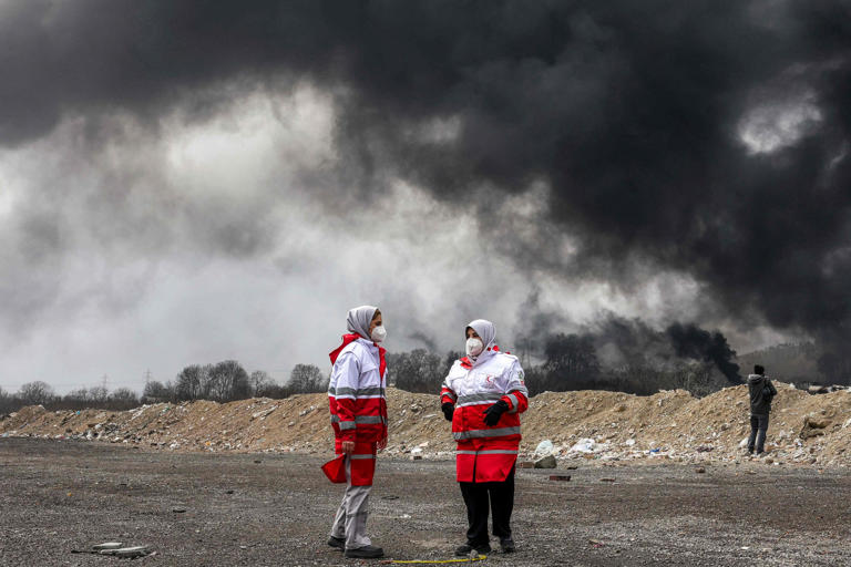 Iran's black rain and toxic smoke raise health concerns