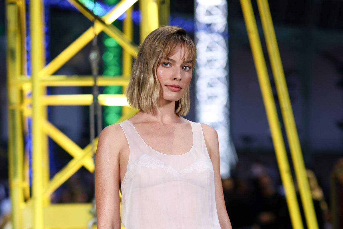 Margot Robbie debuts new haircut as stars attend Chanel show at Paris ...