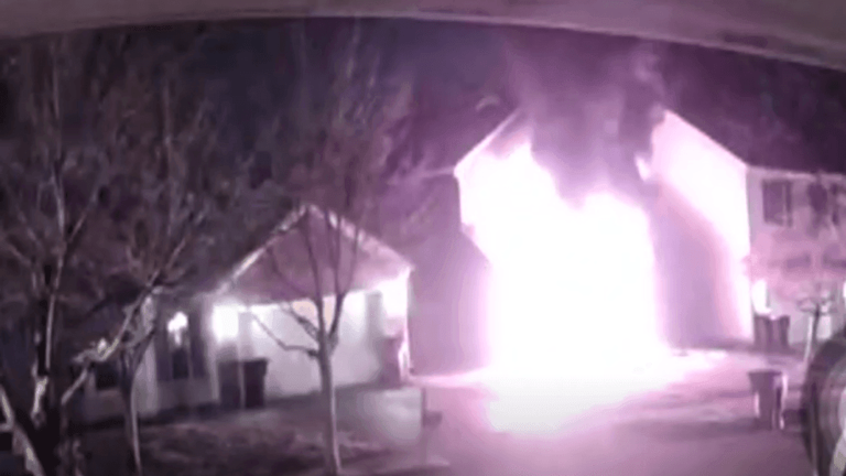 2 people, dog escape from overnight house fire