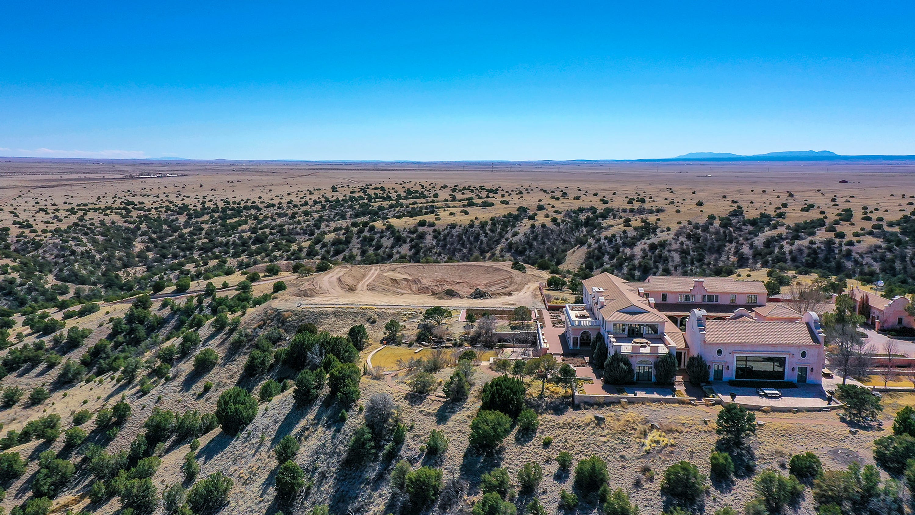 Investigators search former Epstein ranch now owned by Texas ...