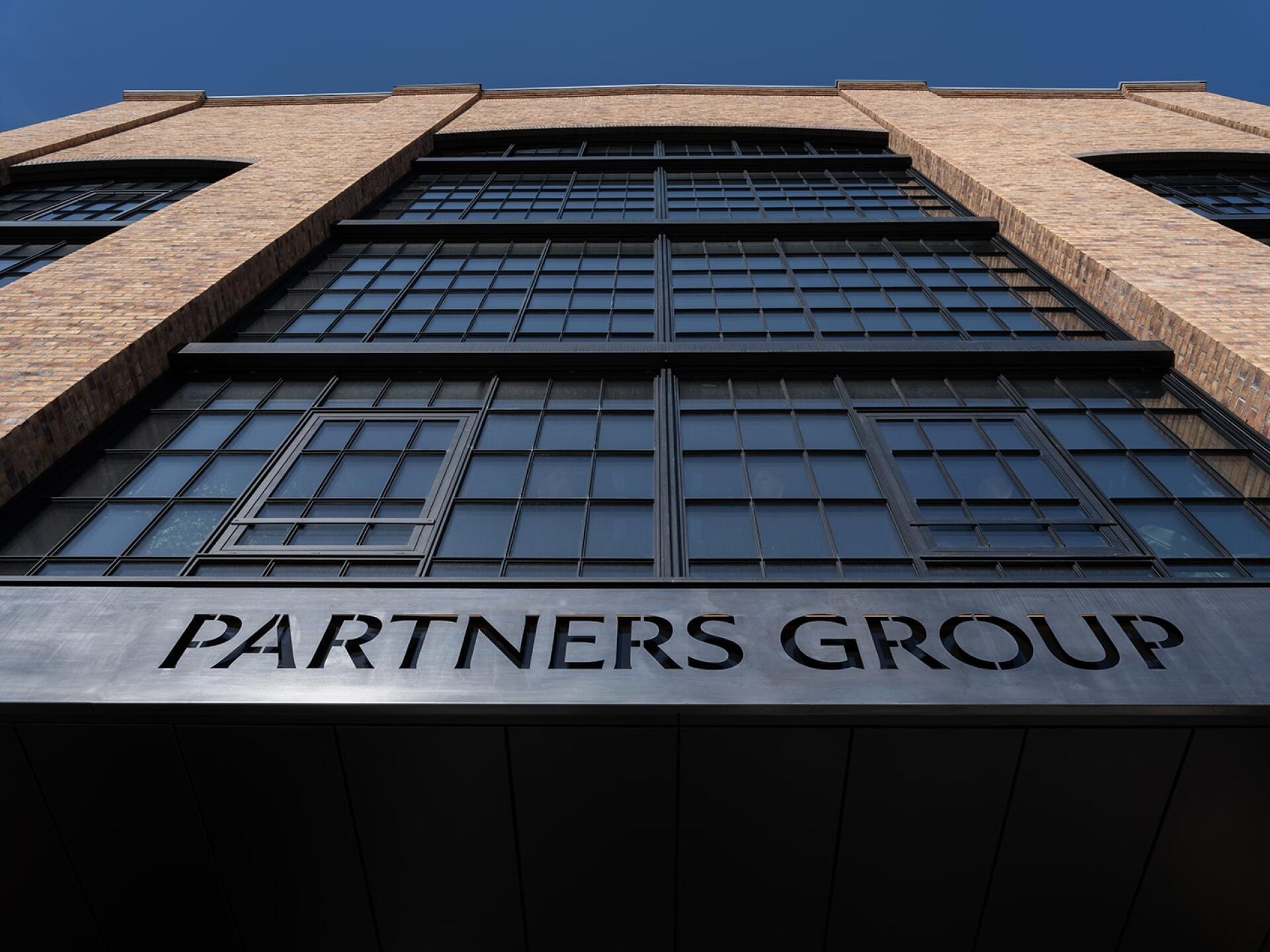 Partners Group legt 2025 um ein Fünftel zu