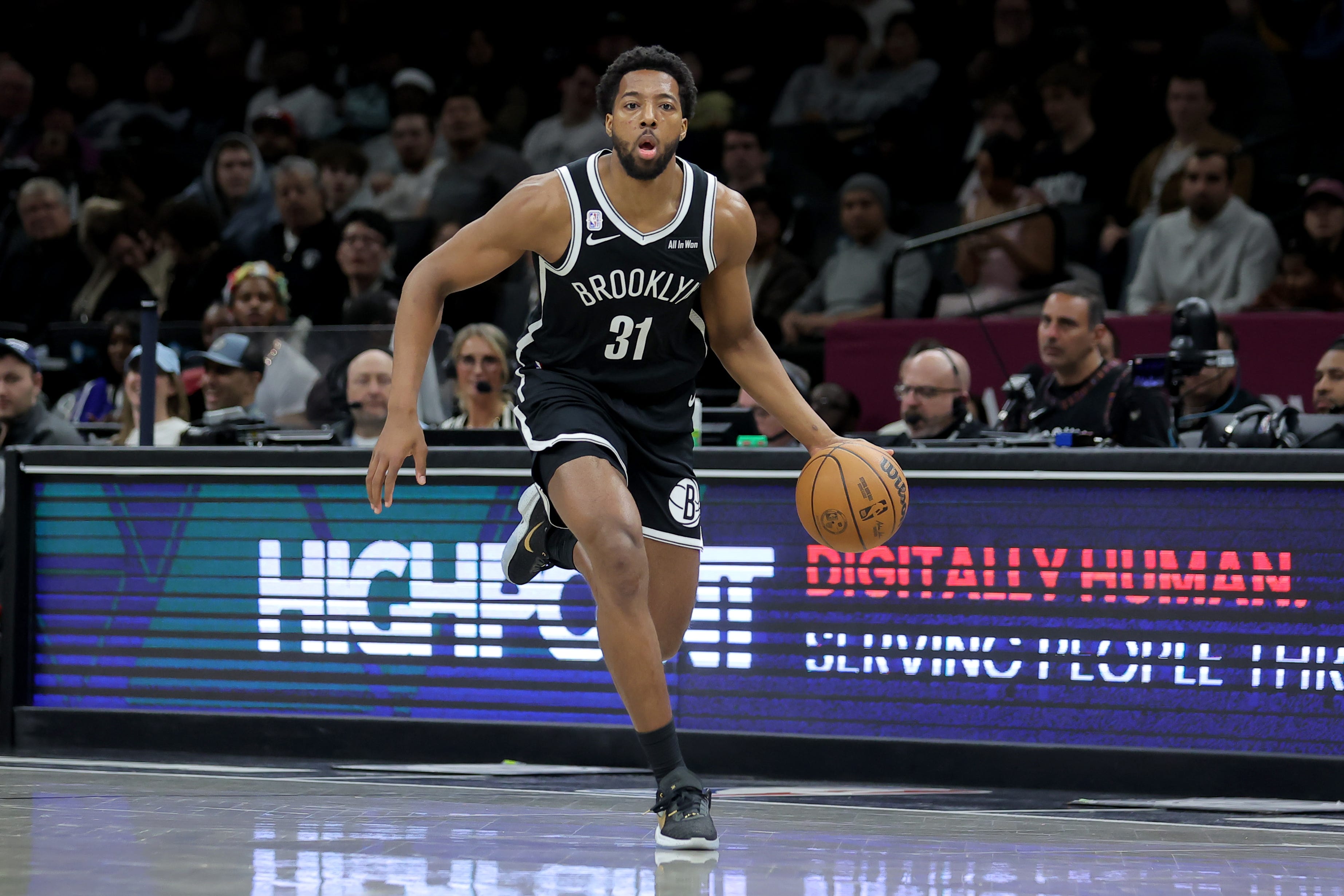Chaney Johnson scores four points in NBA debut with Brooklyn Nets