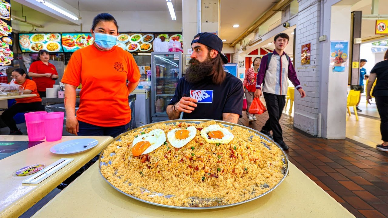 Finish the massive fried rice challenge at this market in Singapore and ...