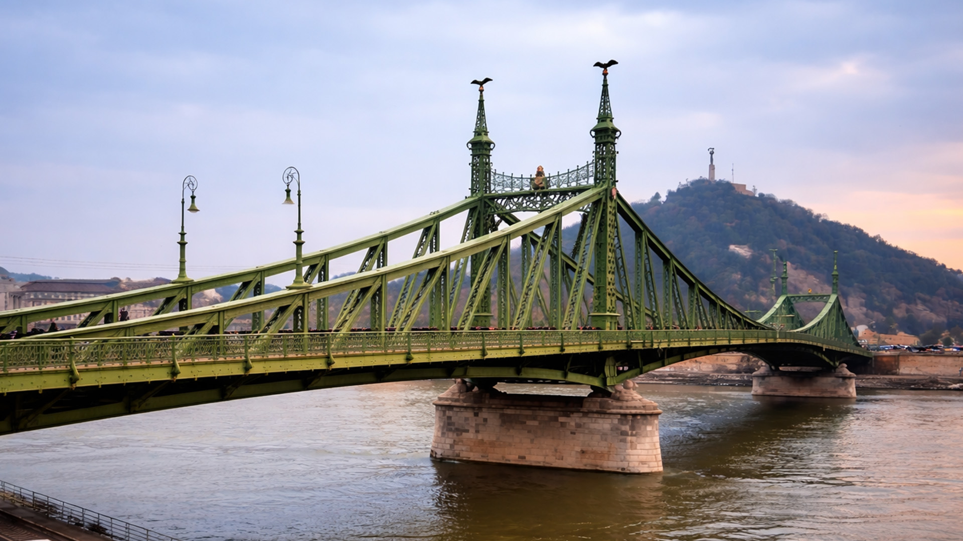 A green bridge that holds more stories than it shows