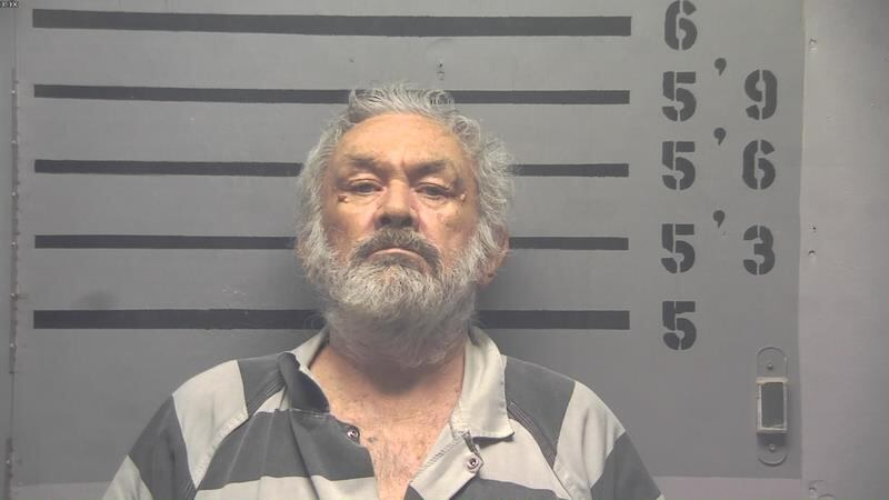 Man arrested after threatening officers, police say