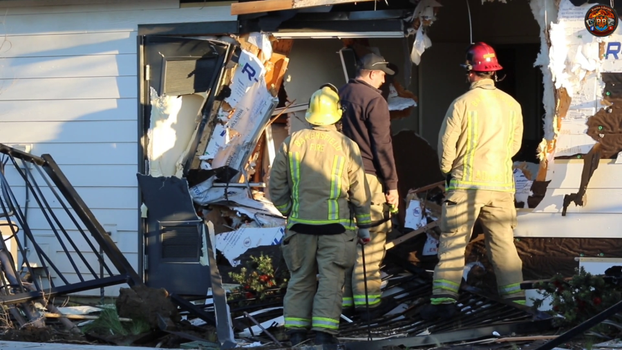 Woman injured after stolen John Deere front loader crashed into ...
