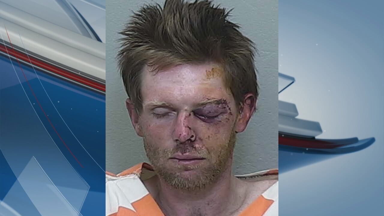 Man arrested after threatening car wash employees with an axe