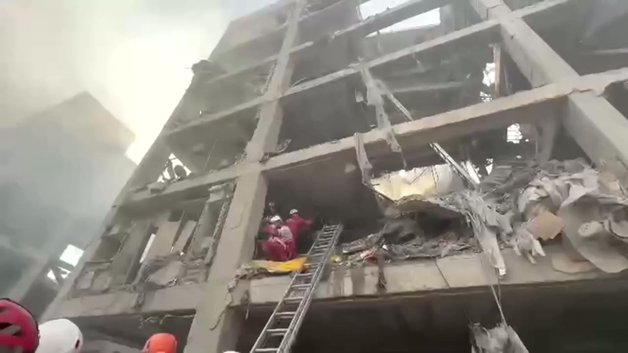 Rescuers bring out wounded from destroyed Tehran apartment blocks<br><br>