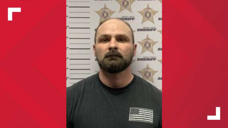 Decatur police officer arrested for stealing from 68-year-old