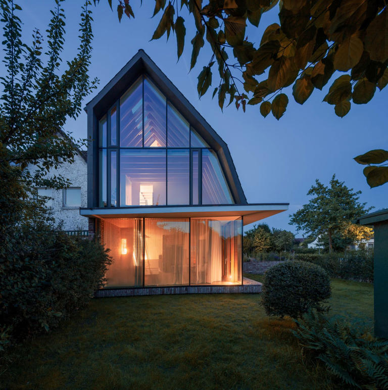 You’d never believe this angular glass facade stands among former ...