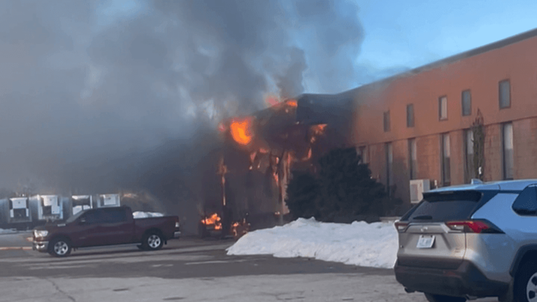 Fire rips through warehouse in Cranston