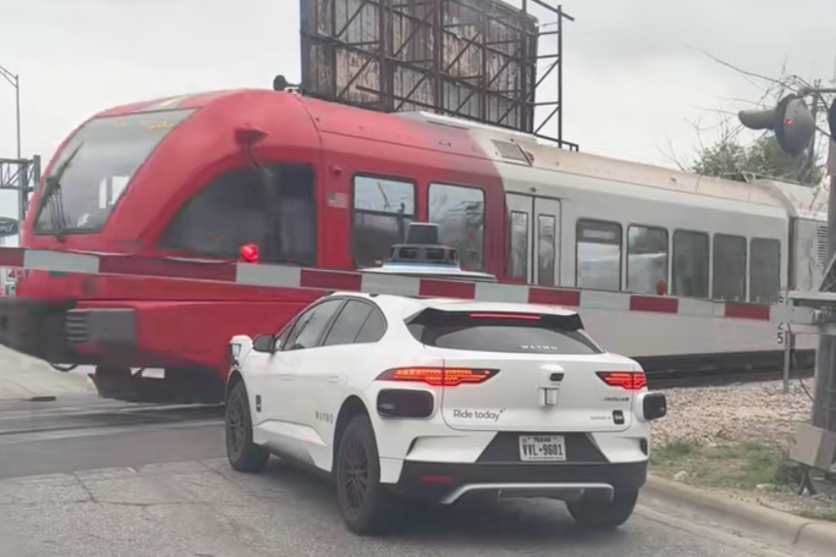 Terrifying moment Waymo stops inches away from passing train<br><br>