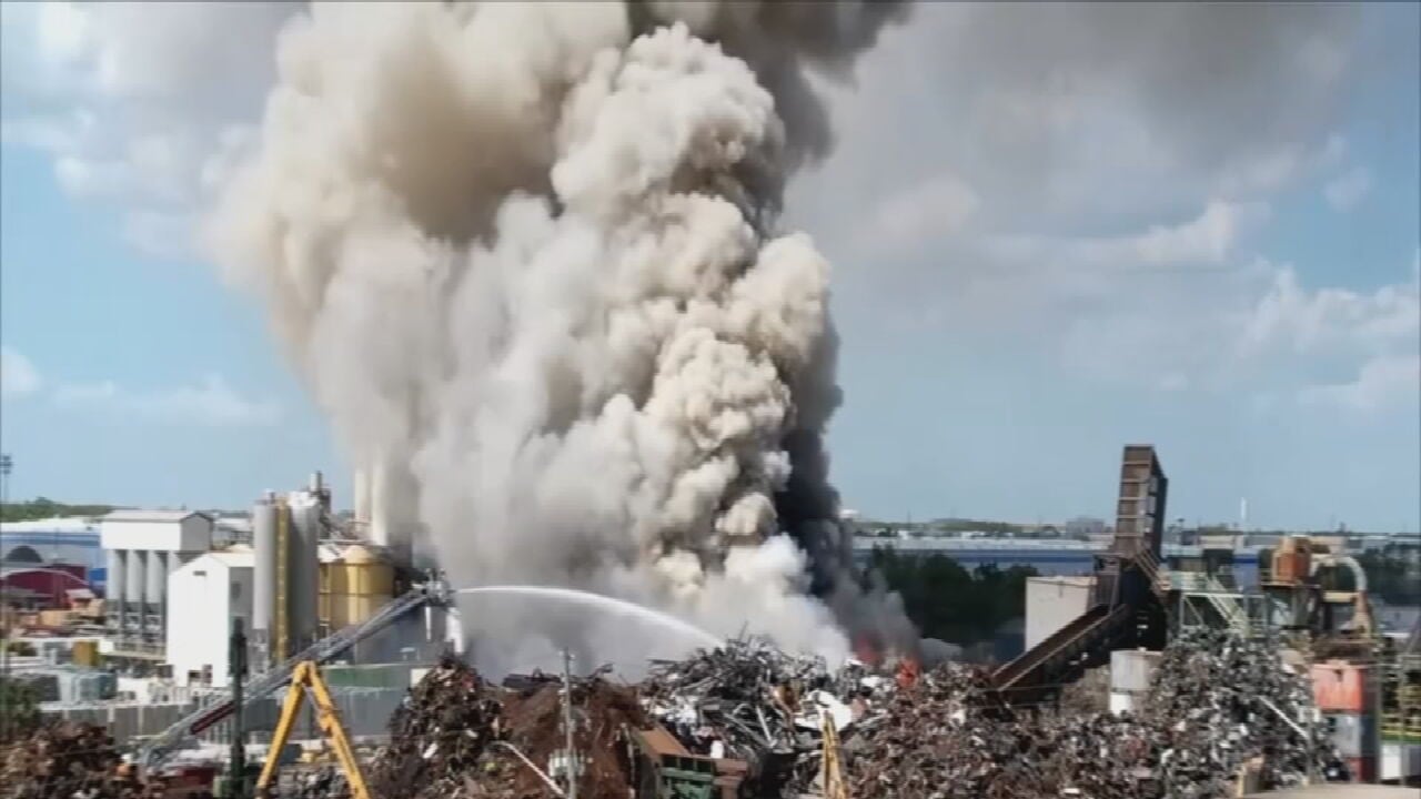 Firefighters monitor scrap metal fire at Orange County recycling yard